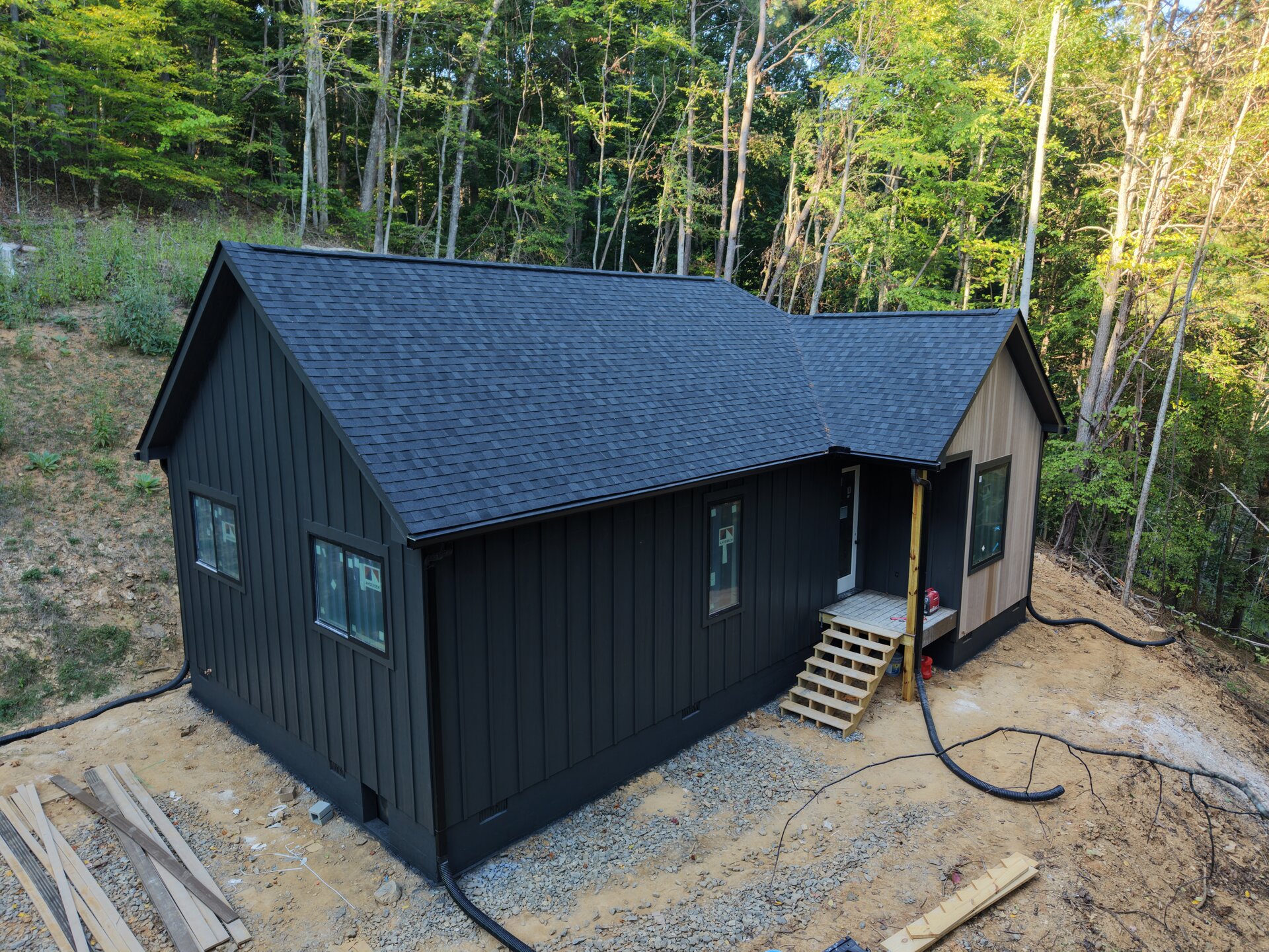 Spec home under construction on a wooded lot in Western North Carolina